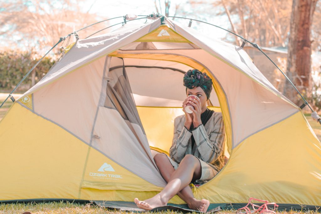 Sipping coffee in a tent at camp oloiden