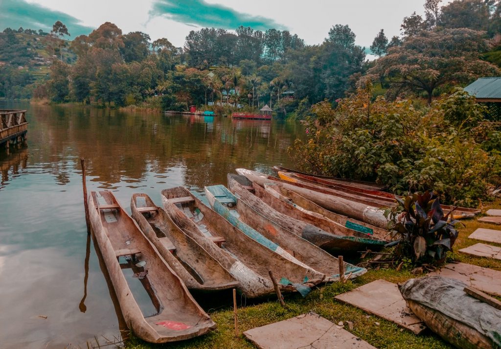 parking spot for Bunyonyi Overland's staff . They use canoes to commute to work daily